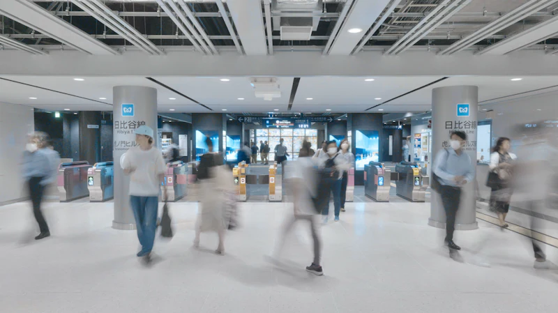 Professionals moving through a modern office